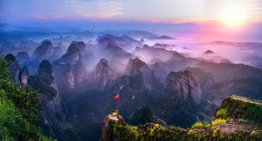 Danxia Landscapes: How Red Rock, Water, and Time Shaped China’s Crimson Cliffs